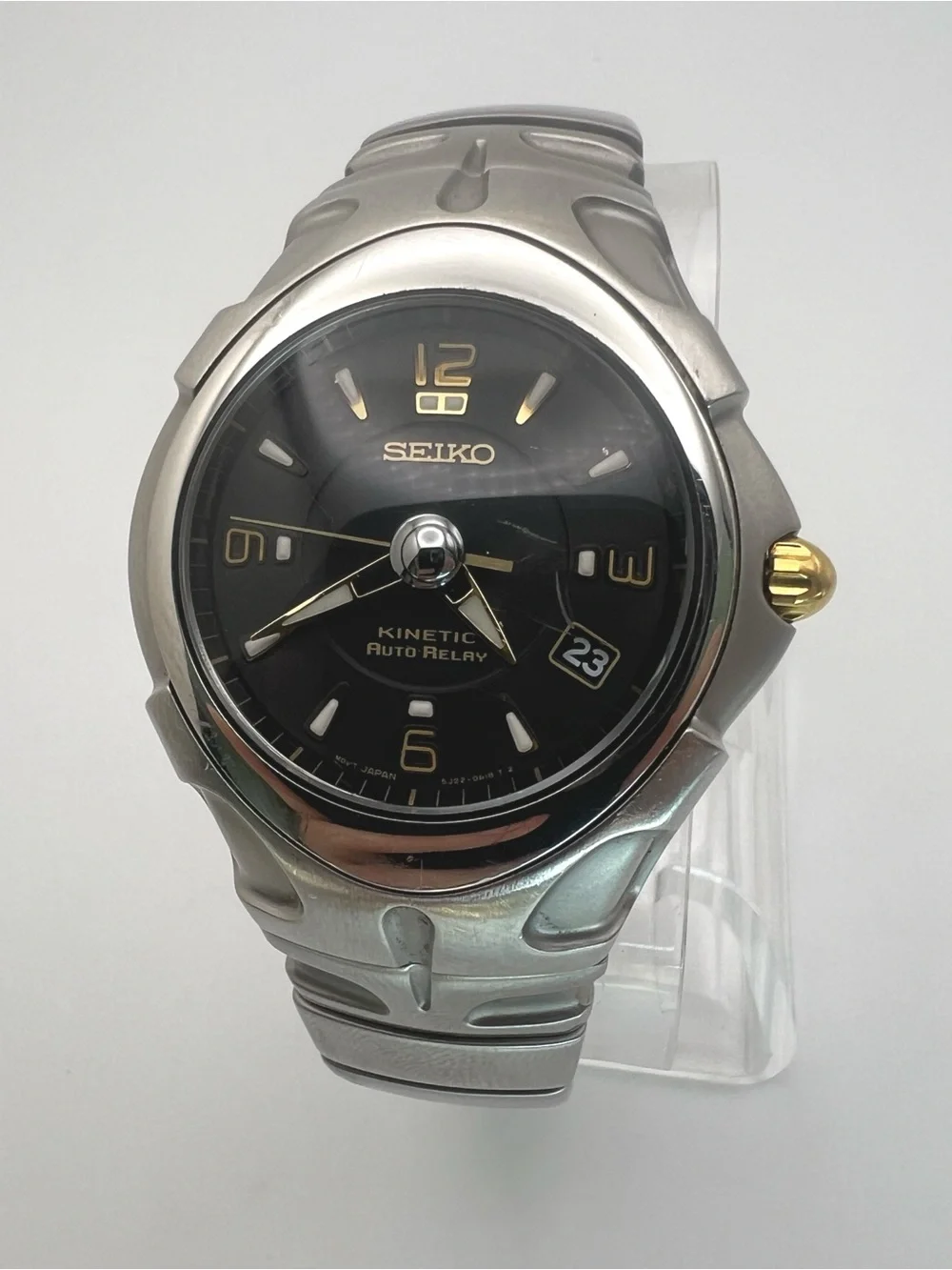 Seiko Kinetic Auto Relay Black Dial Stainless Steel Watch with Gold Accents